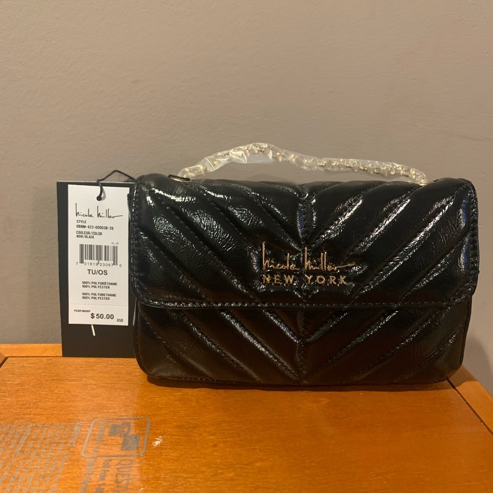 Nicole Miller Crossbody NWT. Approx 8x5x2 Long chain tuck into purse.